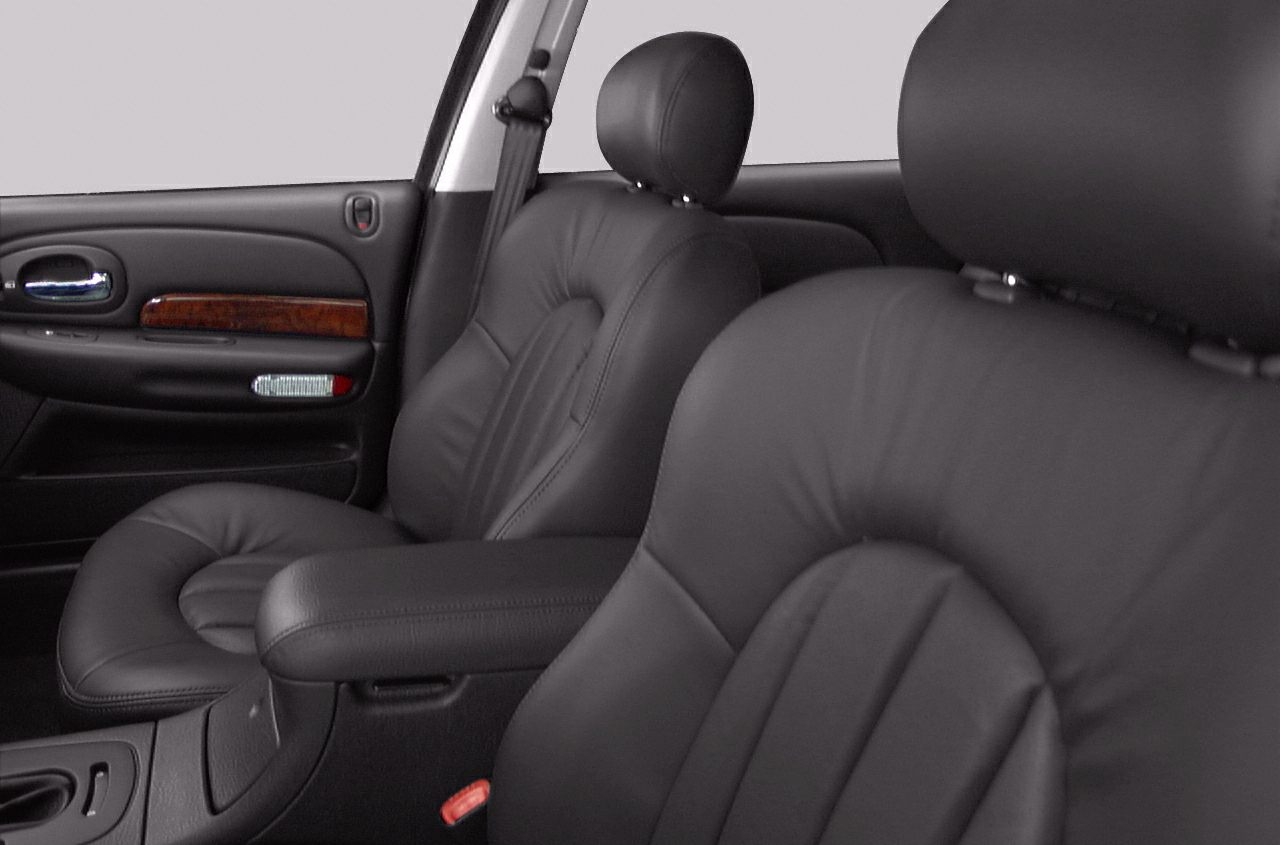 Black leather front seats with wood trim door panel and armrest