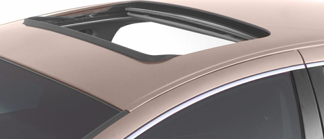 Open sunroof with visible rubber seal and window glass side