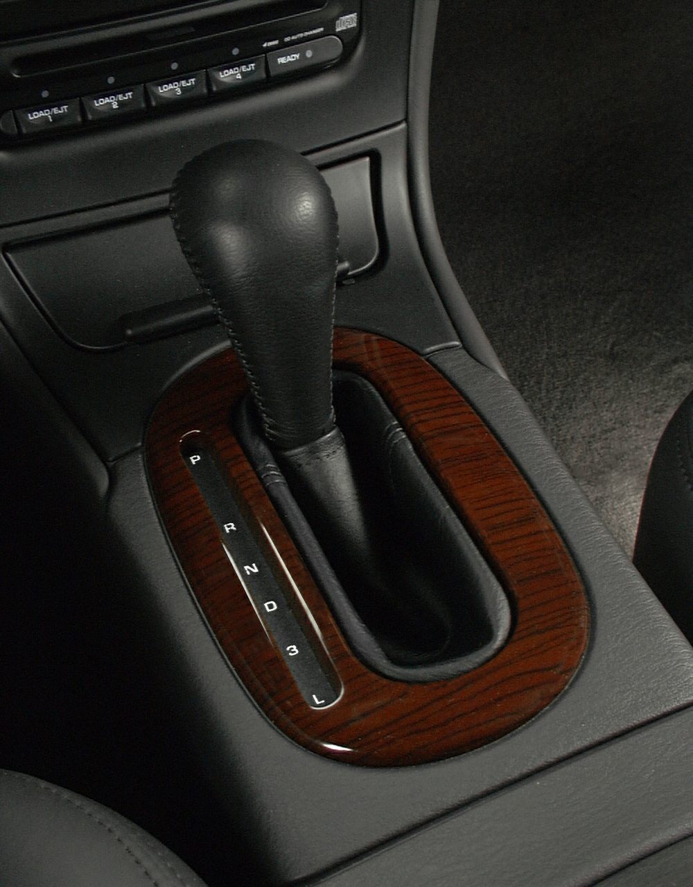 Automatic gear shift lever with wood trim and leather cover