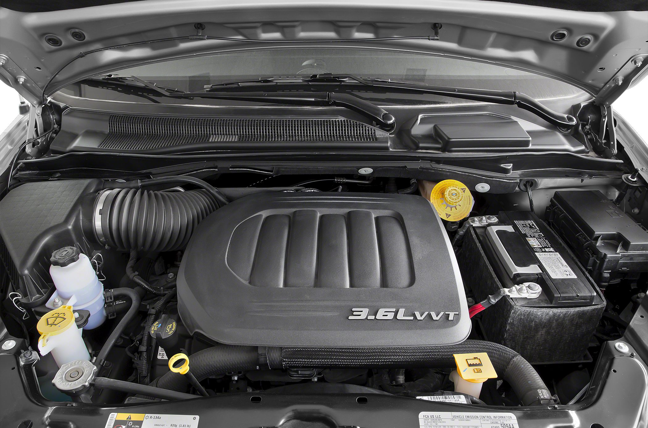 3.6L VVT engine cover with battery and fluid reservoirs under open hood