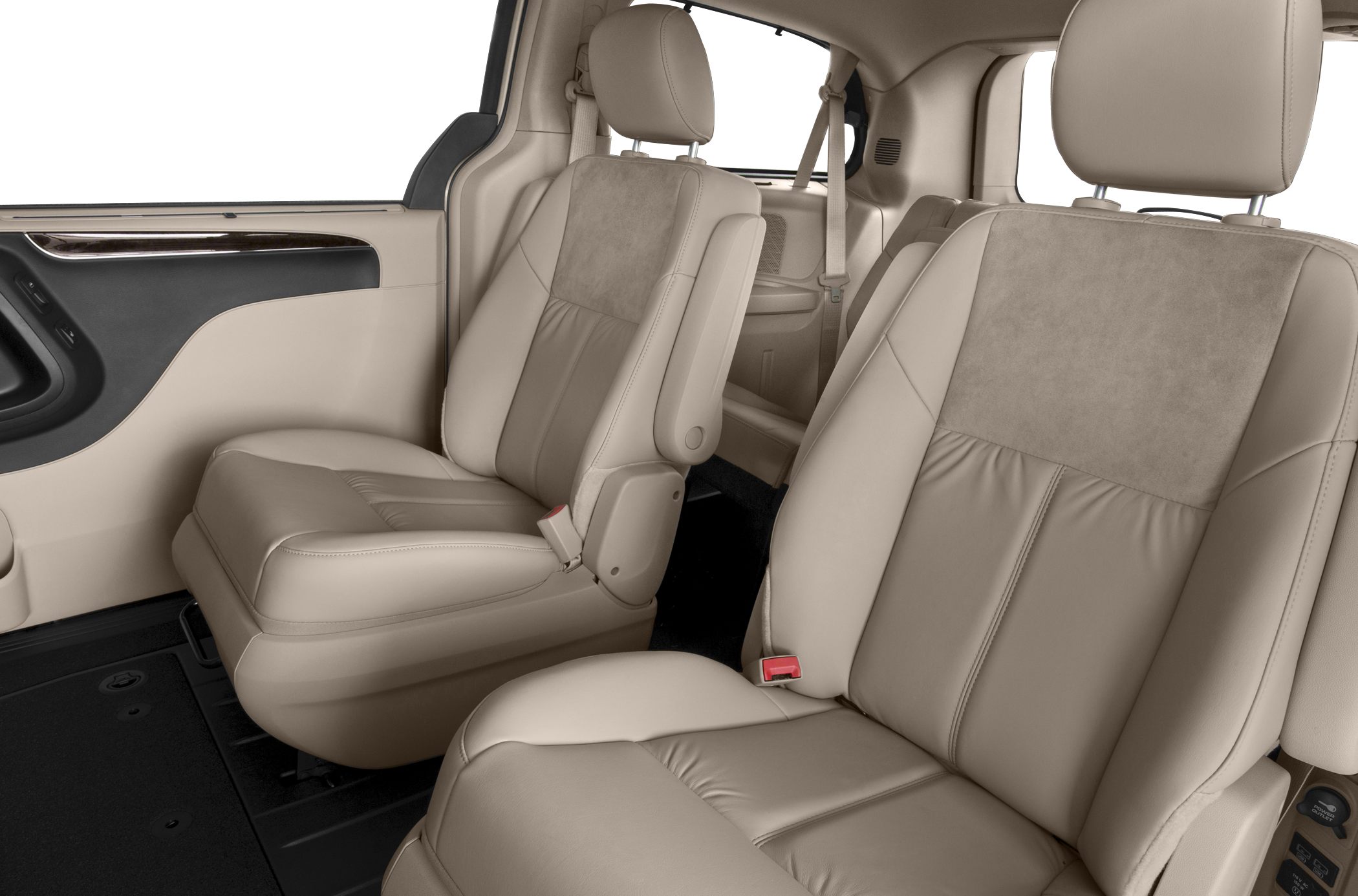 Beige leather captain seats with adjustable headrests in minivan interior