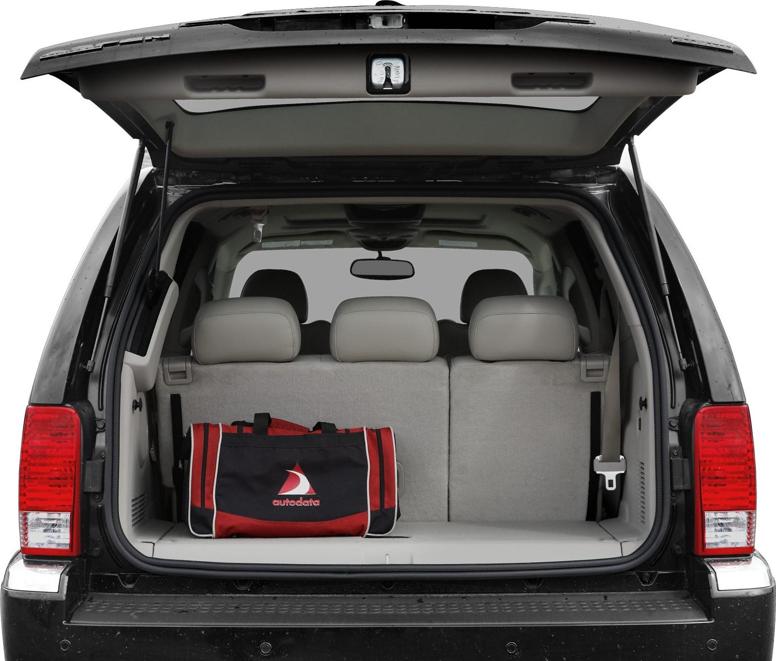 Open rear tailgate and spacious cargo area with seating