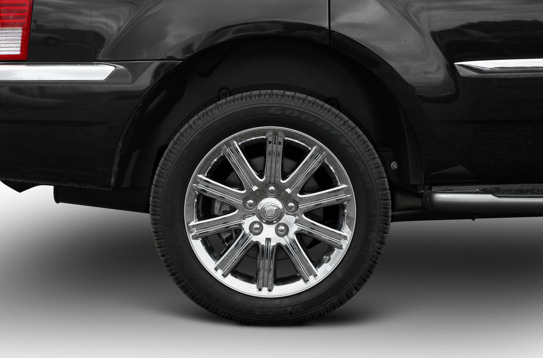 Chrome alloy rim with Goodyear tire on SUV wheel