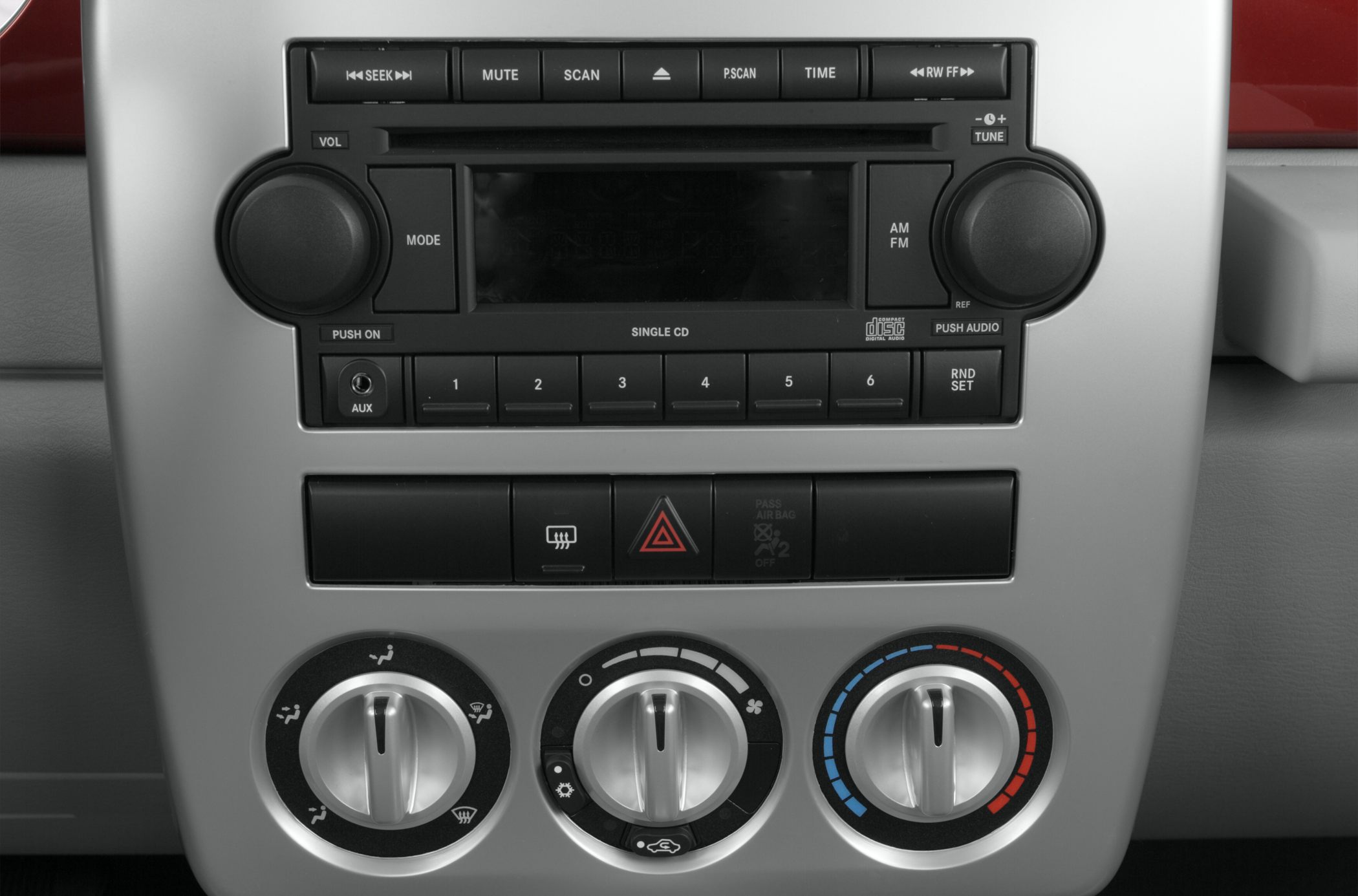 Dashboard audio system and climate control knobs