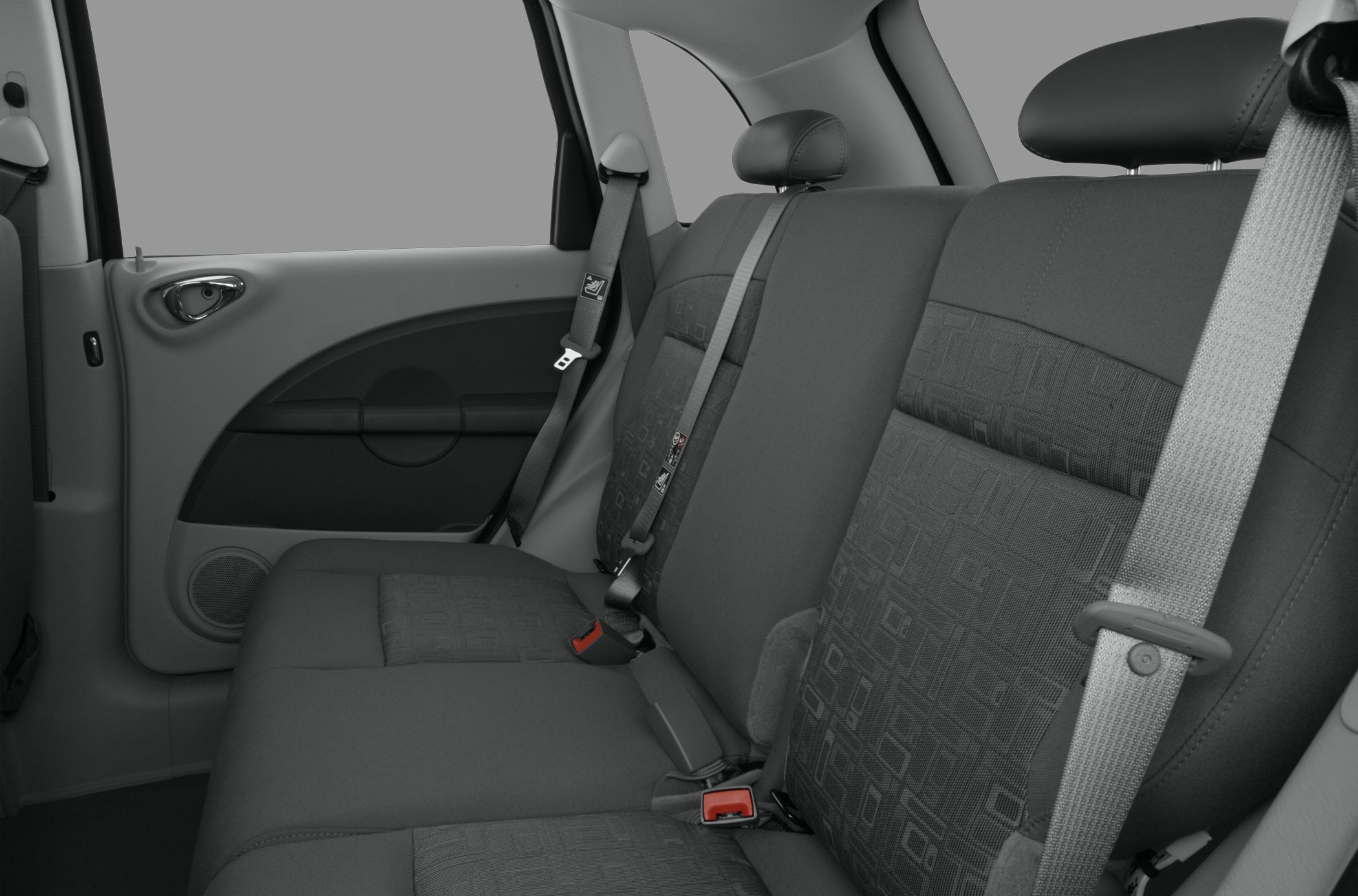 Rear seat with seat belts and patterned upholstery