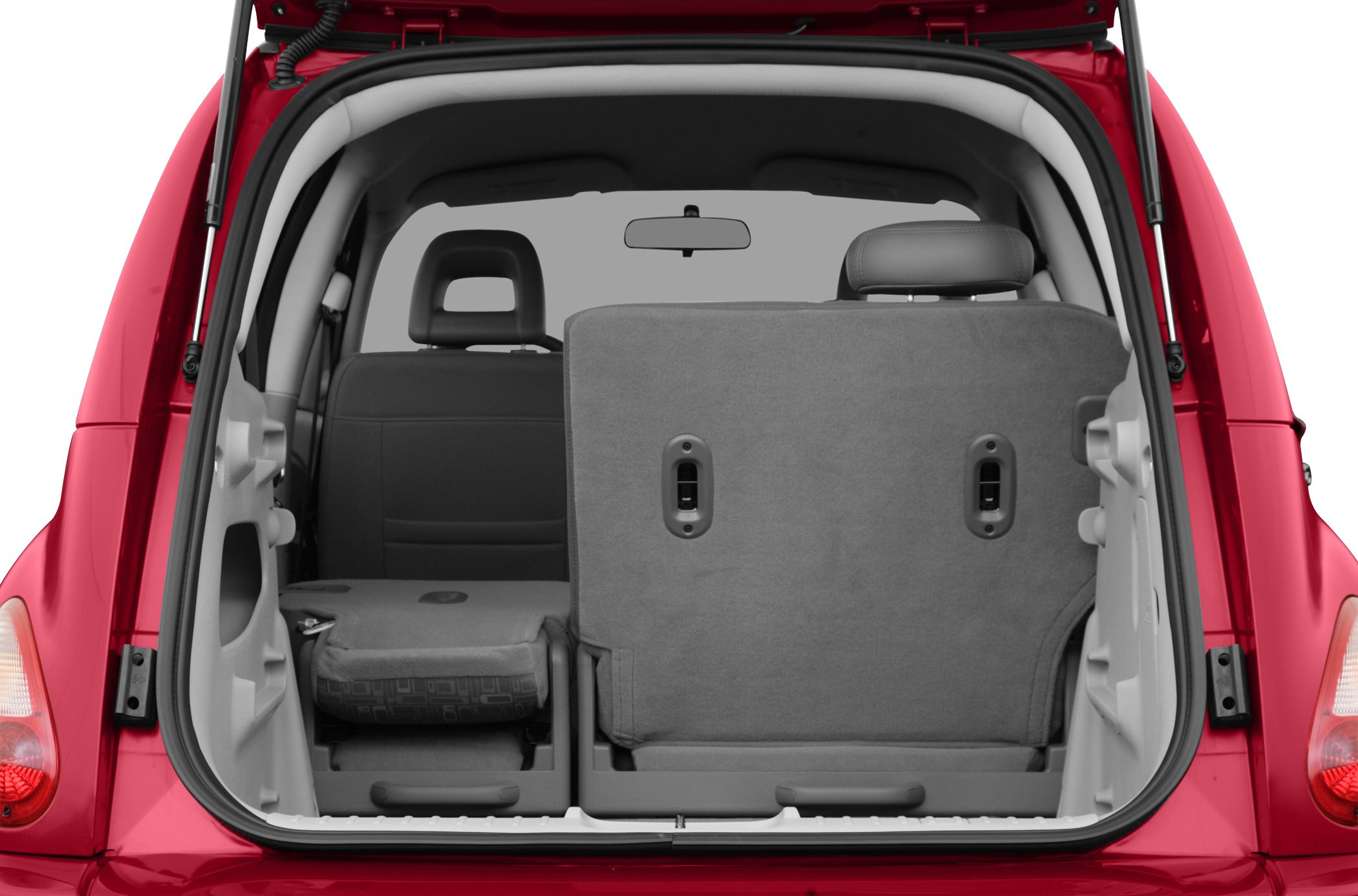 Folding rear seats with headrests and cargo area