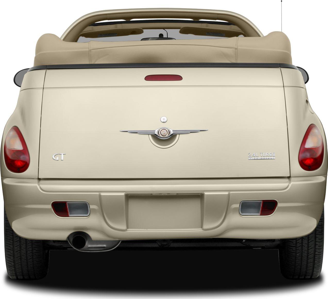 Rear view of convertible with soft top and turbo badge