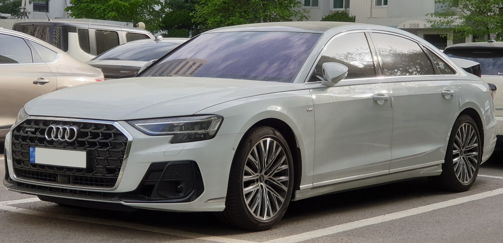 Front three-quarter view showing grille, headlights, and wheels