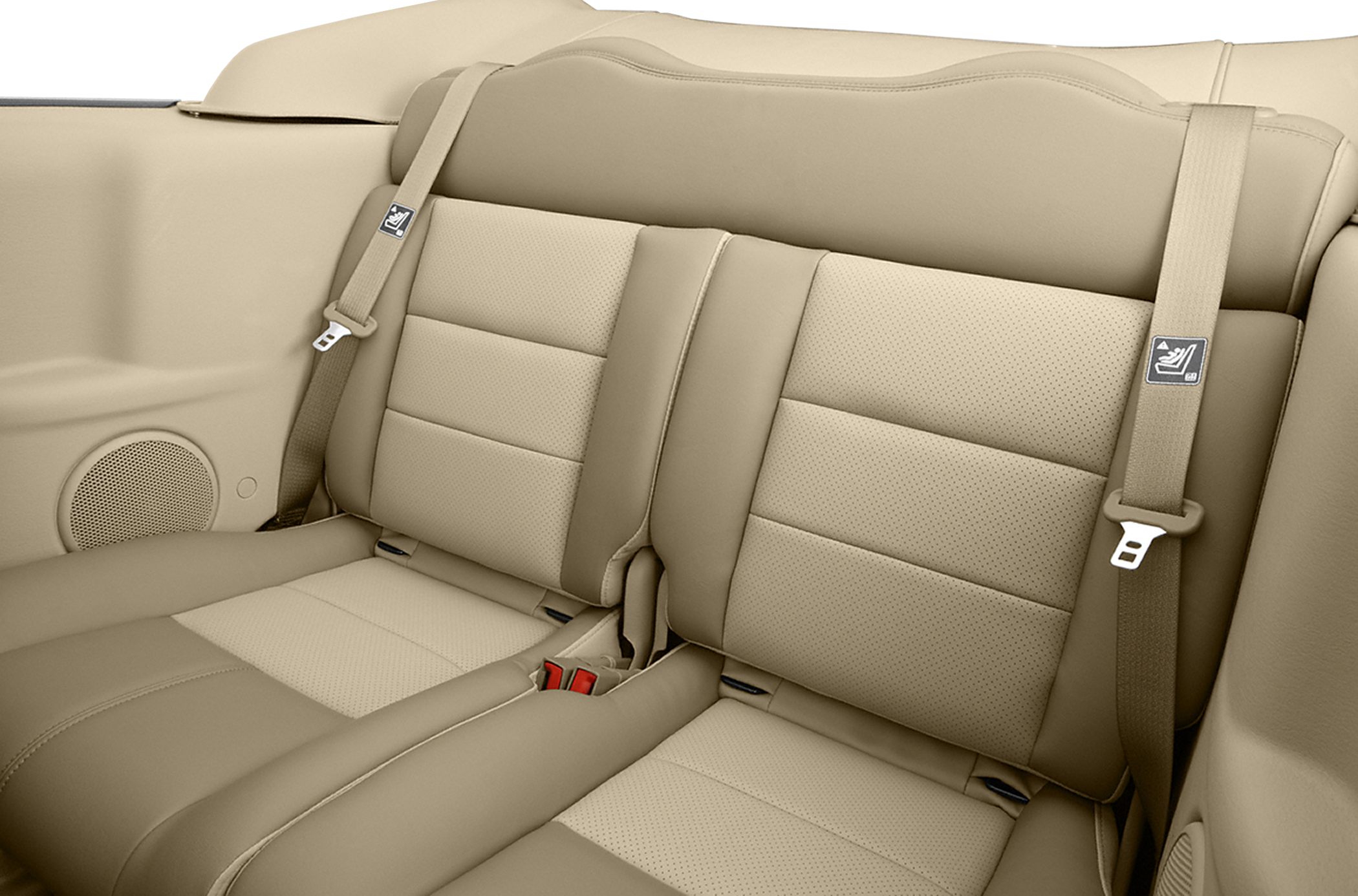 Beige leather rear seats with safety belts in convertible interior