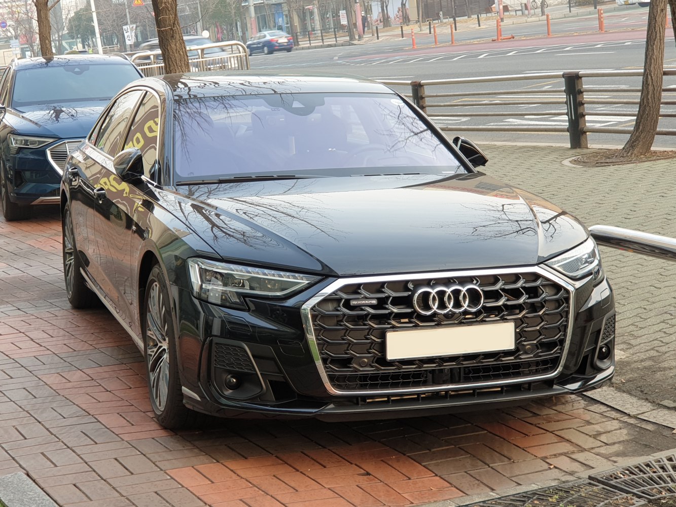 Front grille and LED headlights of a luxury sedan