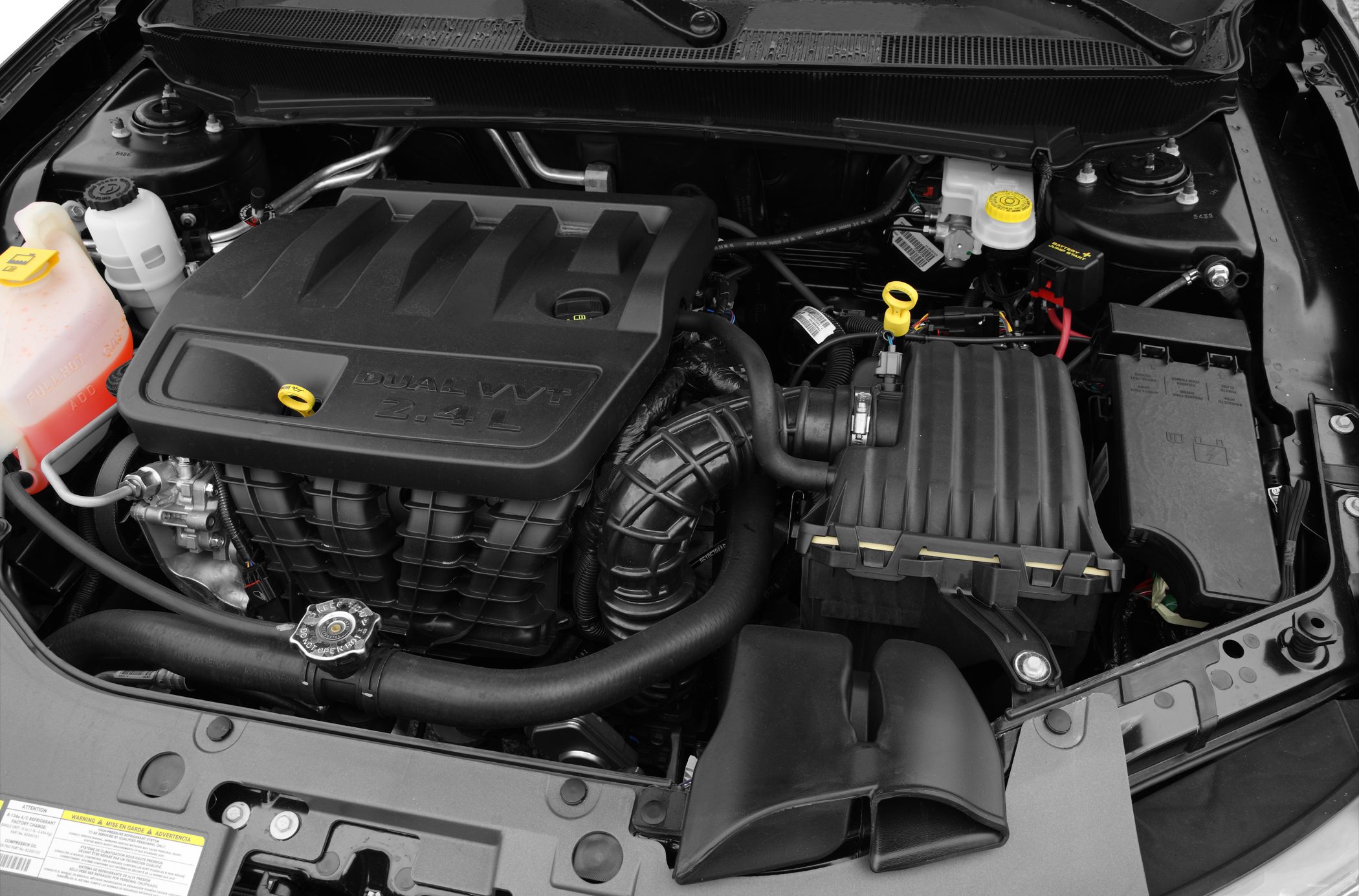 Dual VVT 2.4L engine bay with visible fluid reservoirs and air intake system