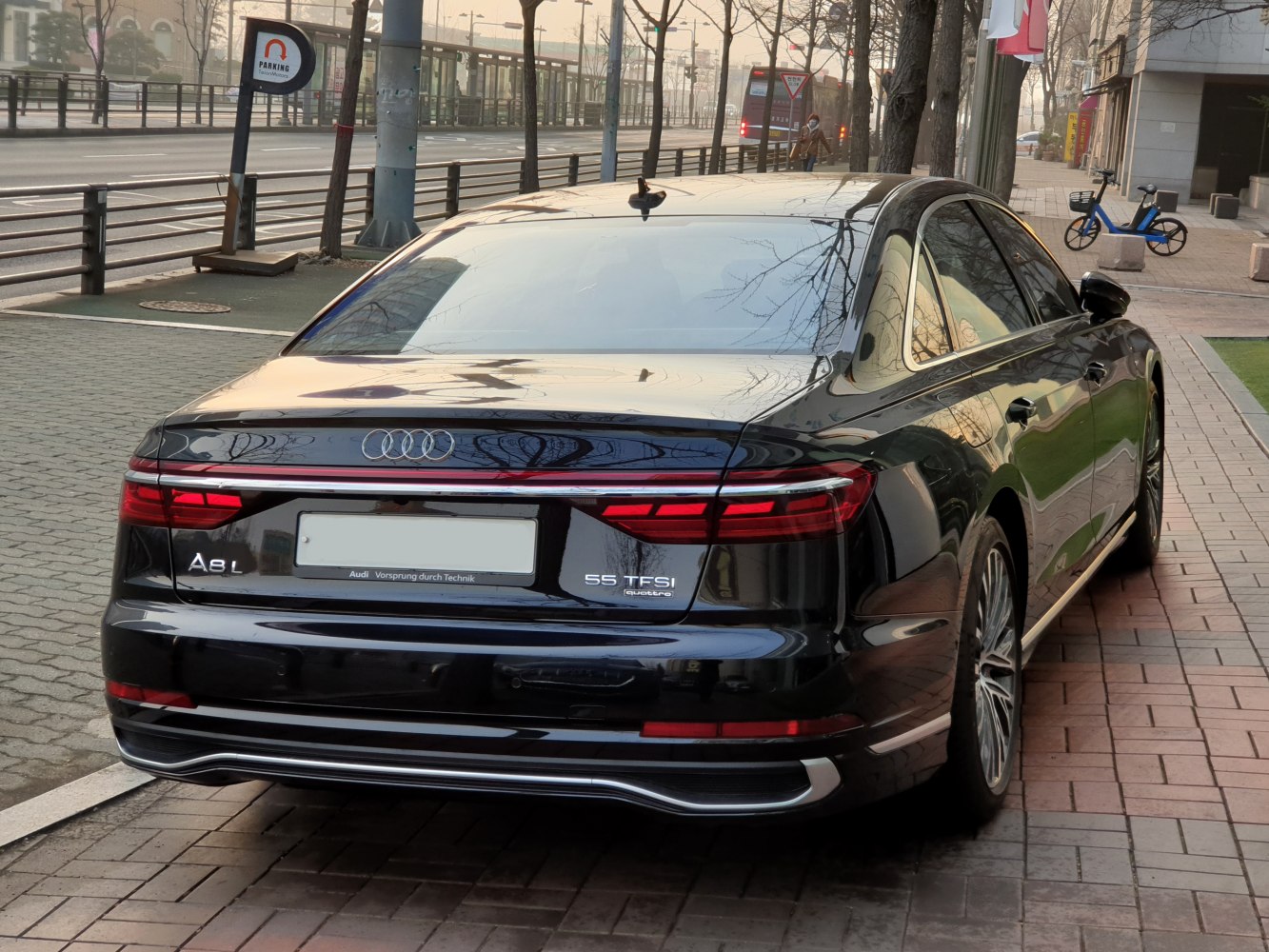Rear view of luxury sedan with full LED tail lights