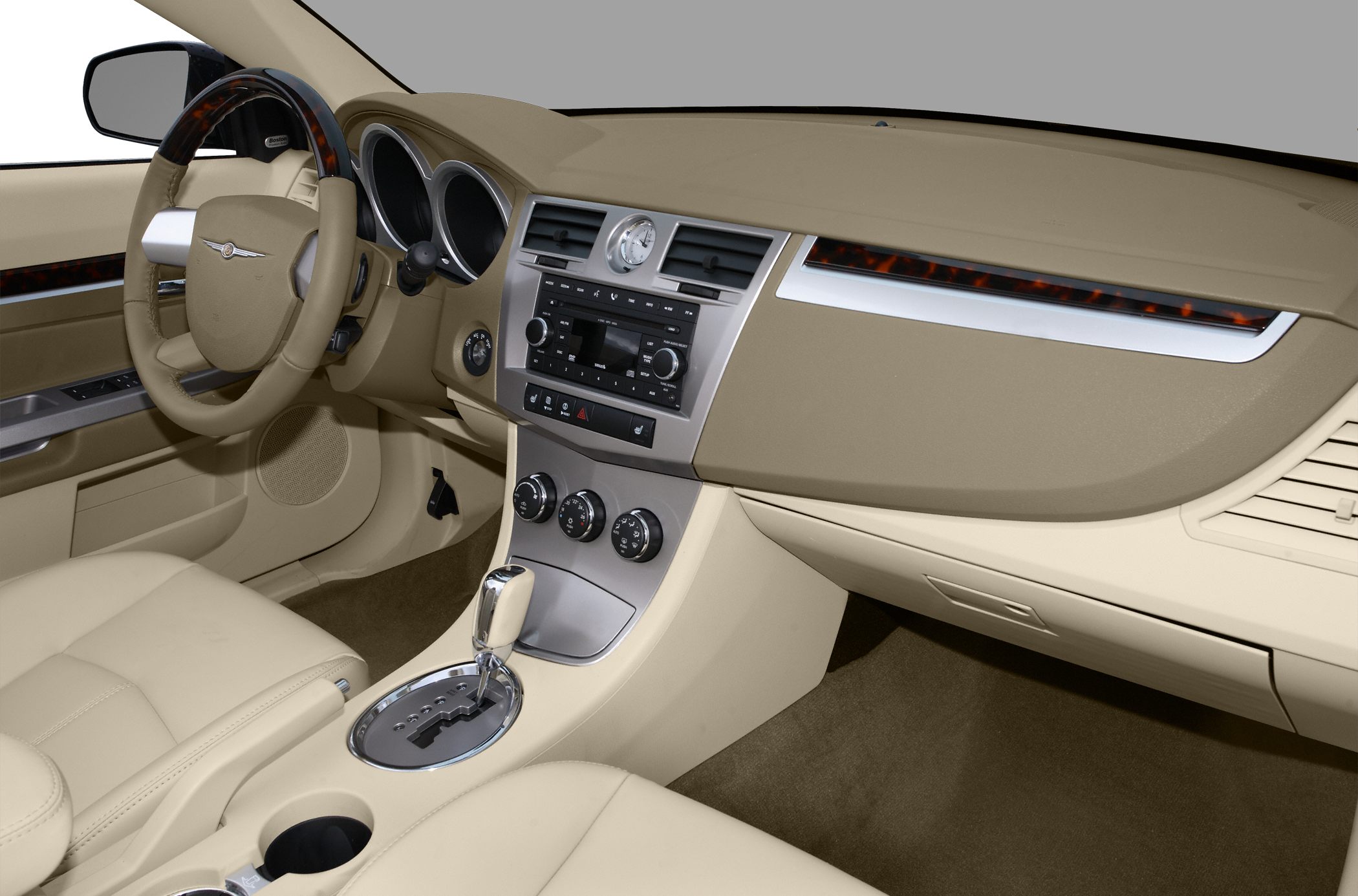 Beige interior with dashboard, steering wheel, and center console