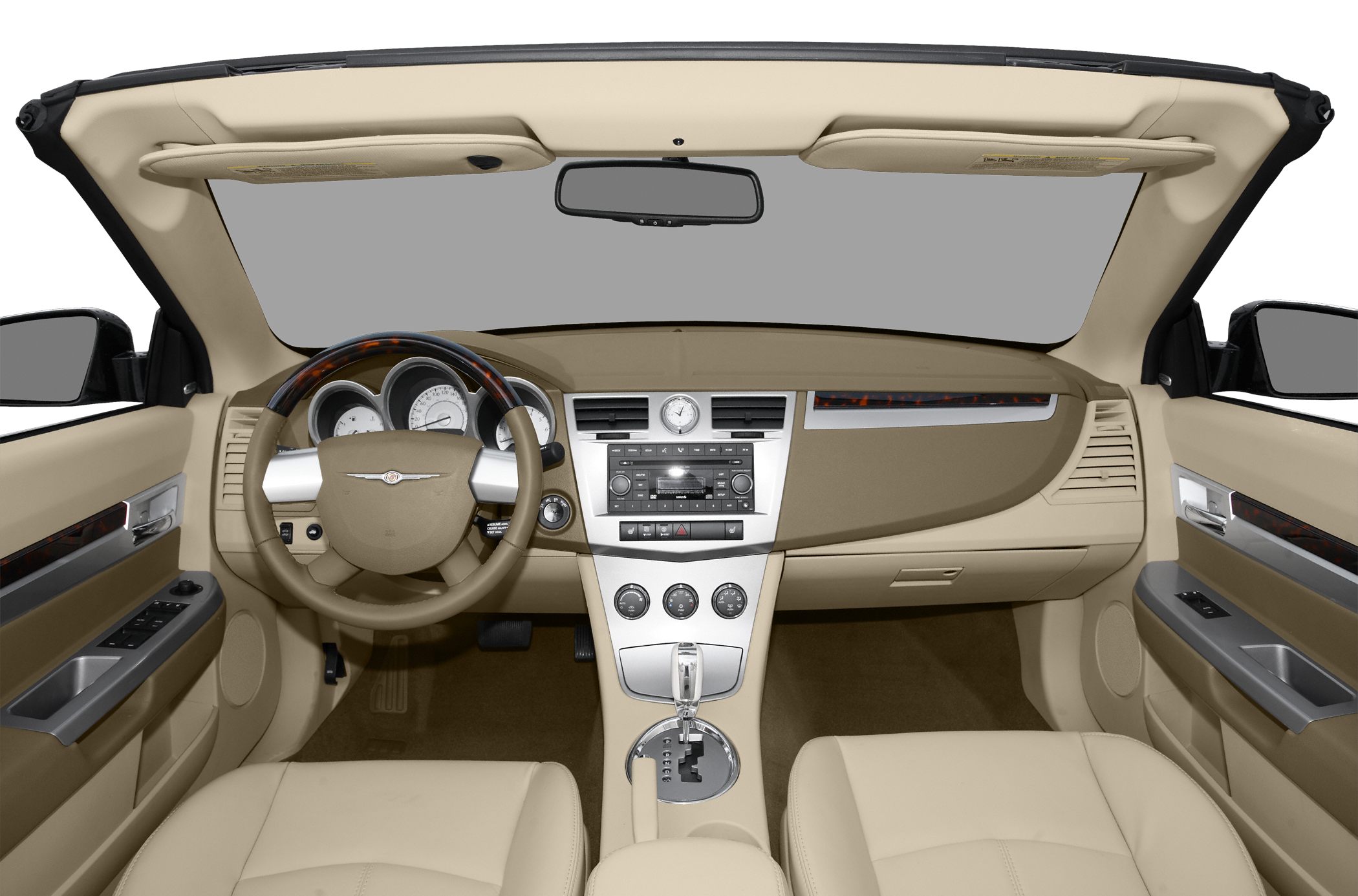 Beige interior dashboard and steering wheel with automatic transmission