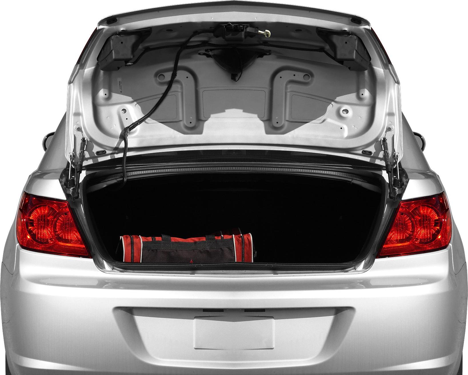 Open trunk with visible interior and red taillights