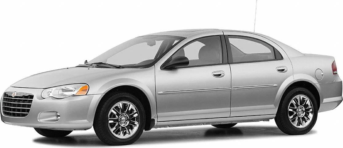 Silver four-door sedan with chrome wheels in side profile view