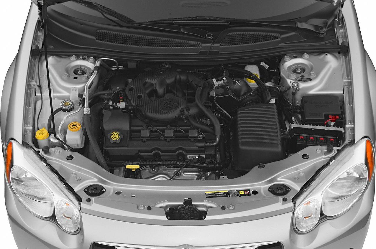 Engine bay and front headlight assemblies with visible engine components