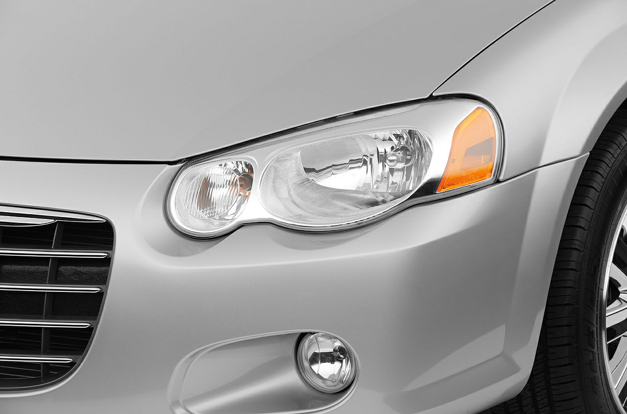 Headlight, turn signal, fog light, and front bumper details