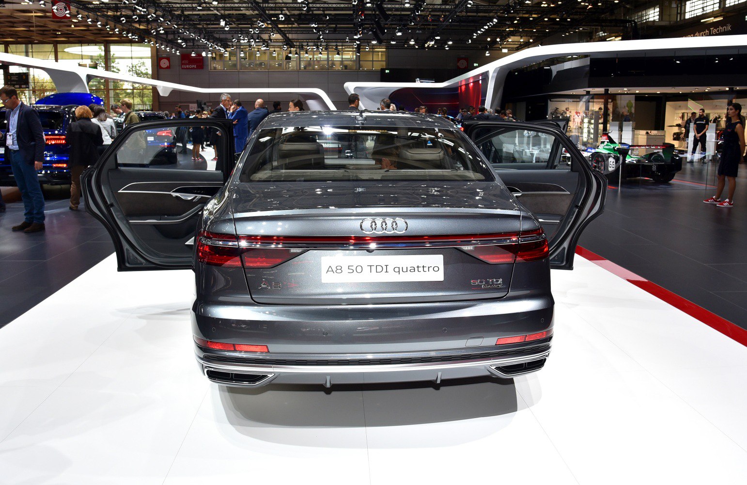 Rear view with continuous LED taillights and open rear doors