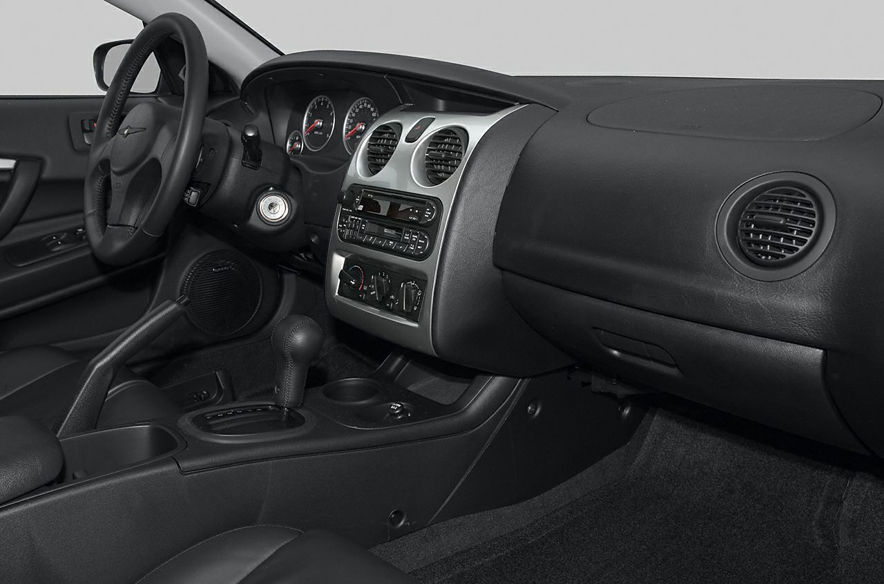 Dashboard and center console with controls and steering wheel
