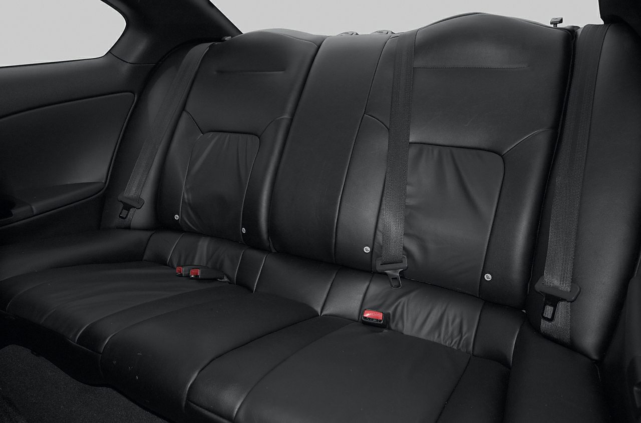 Black leather rear seats with integrated seat belts and bolstered design