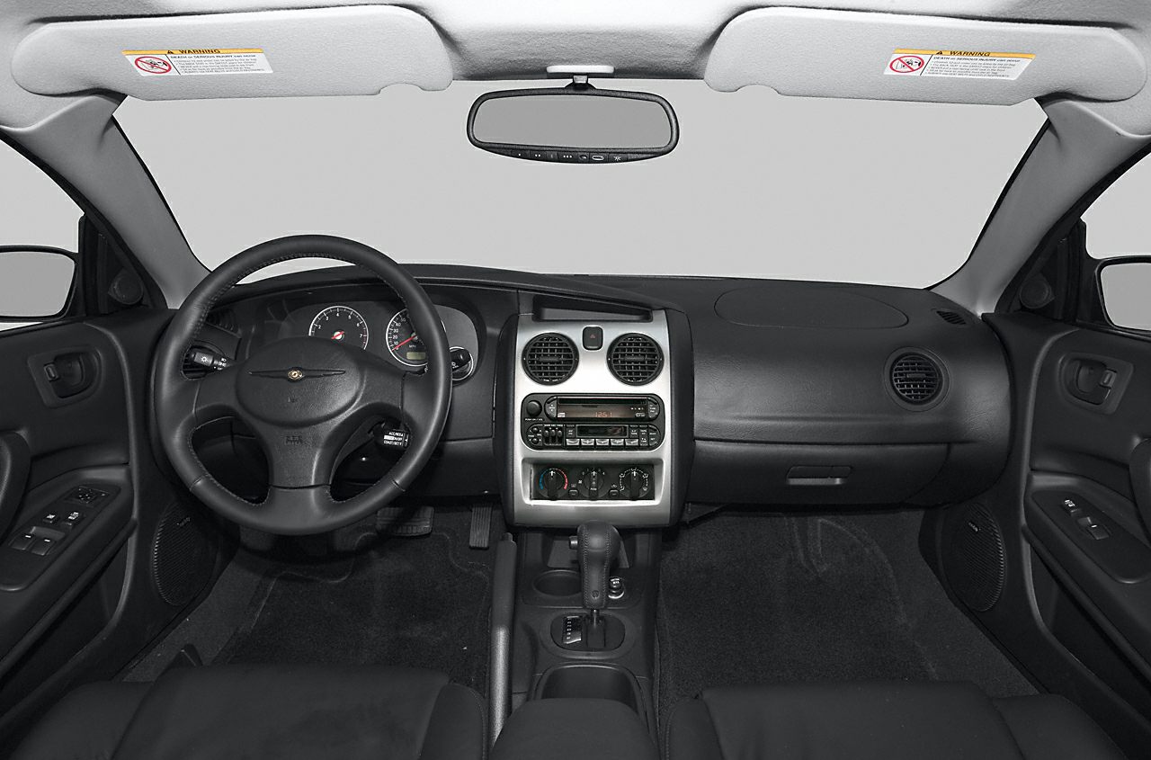 Dashboard and steering wheel with center console and gear shift
