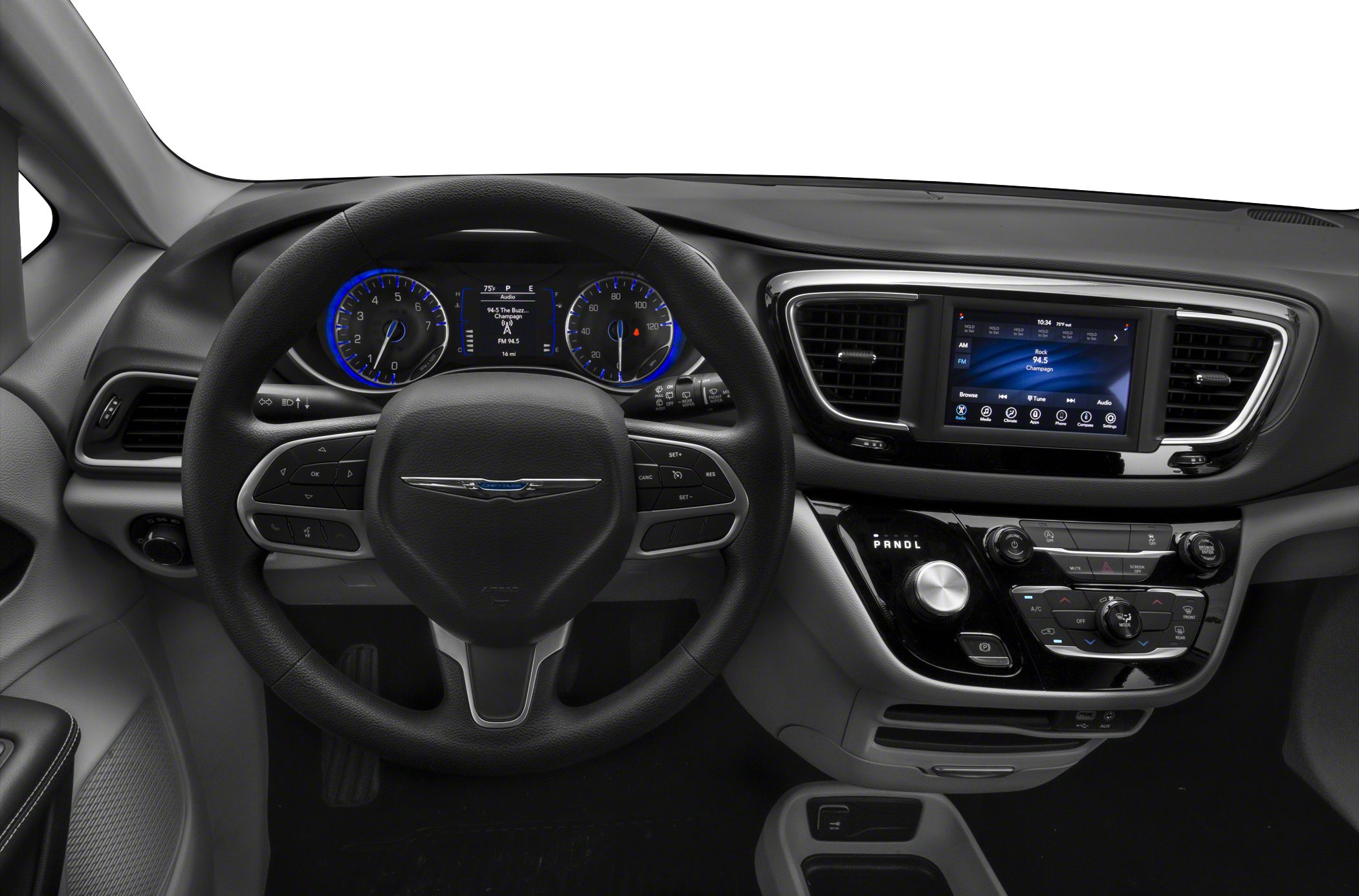 Steering wheel with digital gauge cluster and central touchscreen infotainment.