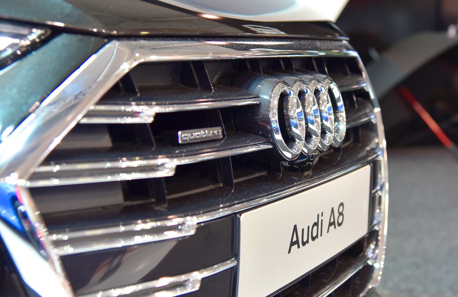 Close-up of front grille with quattro badge