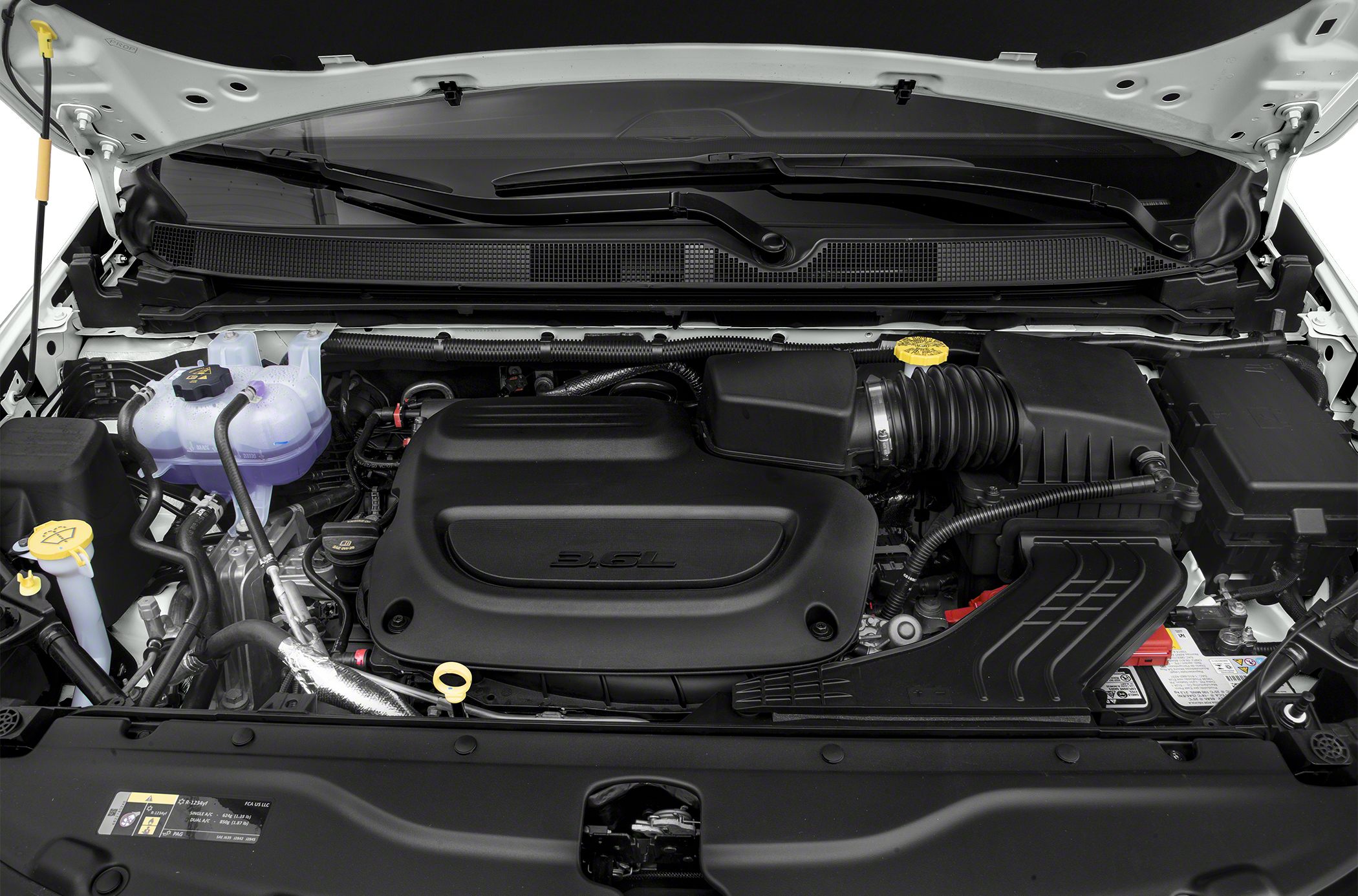 3.6L engine with components and fluid reservoirs under hood
