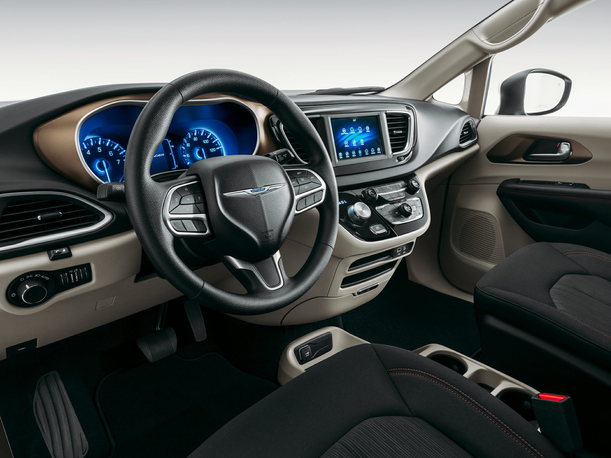 Digital instrument cluster and touchscreen infotainment display in vehicle interior