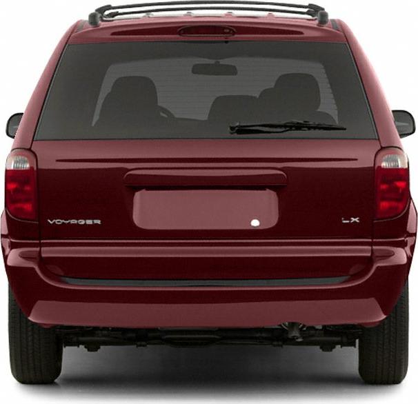 Rear view of a minivan with tinted rear window and roof rails