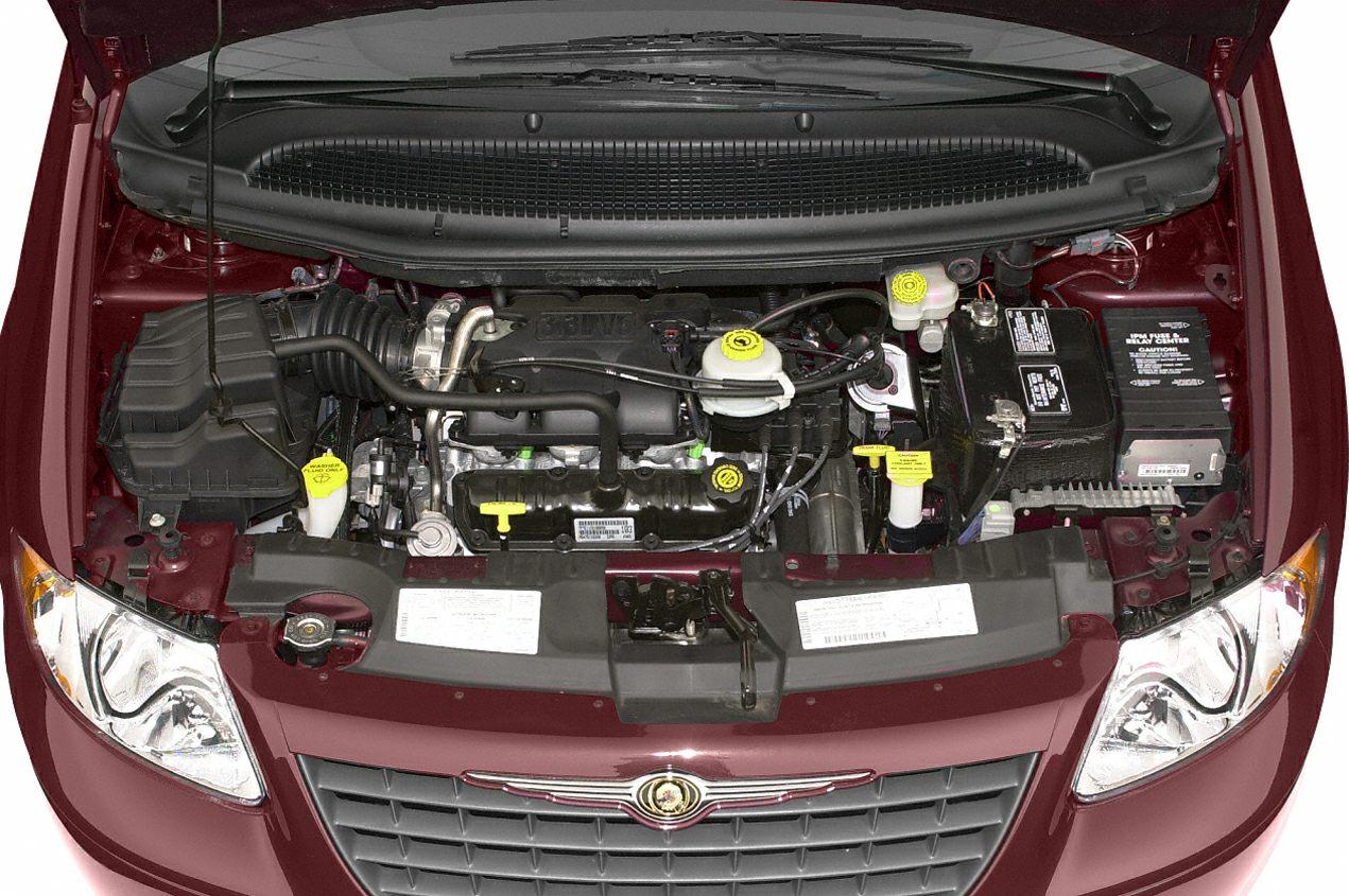 Front engine bay with visible components and hood open.