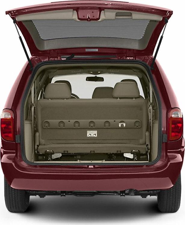Open rear liftgate revealing spacious cargo area and seating