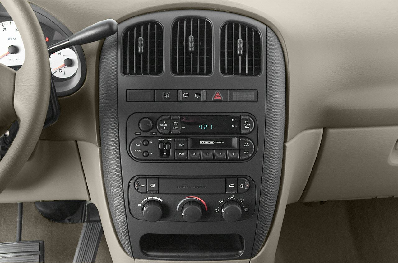 Dashboard and center console with air vents, audio system, and climate controls.