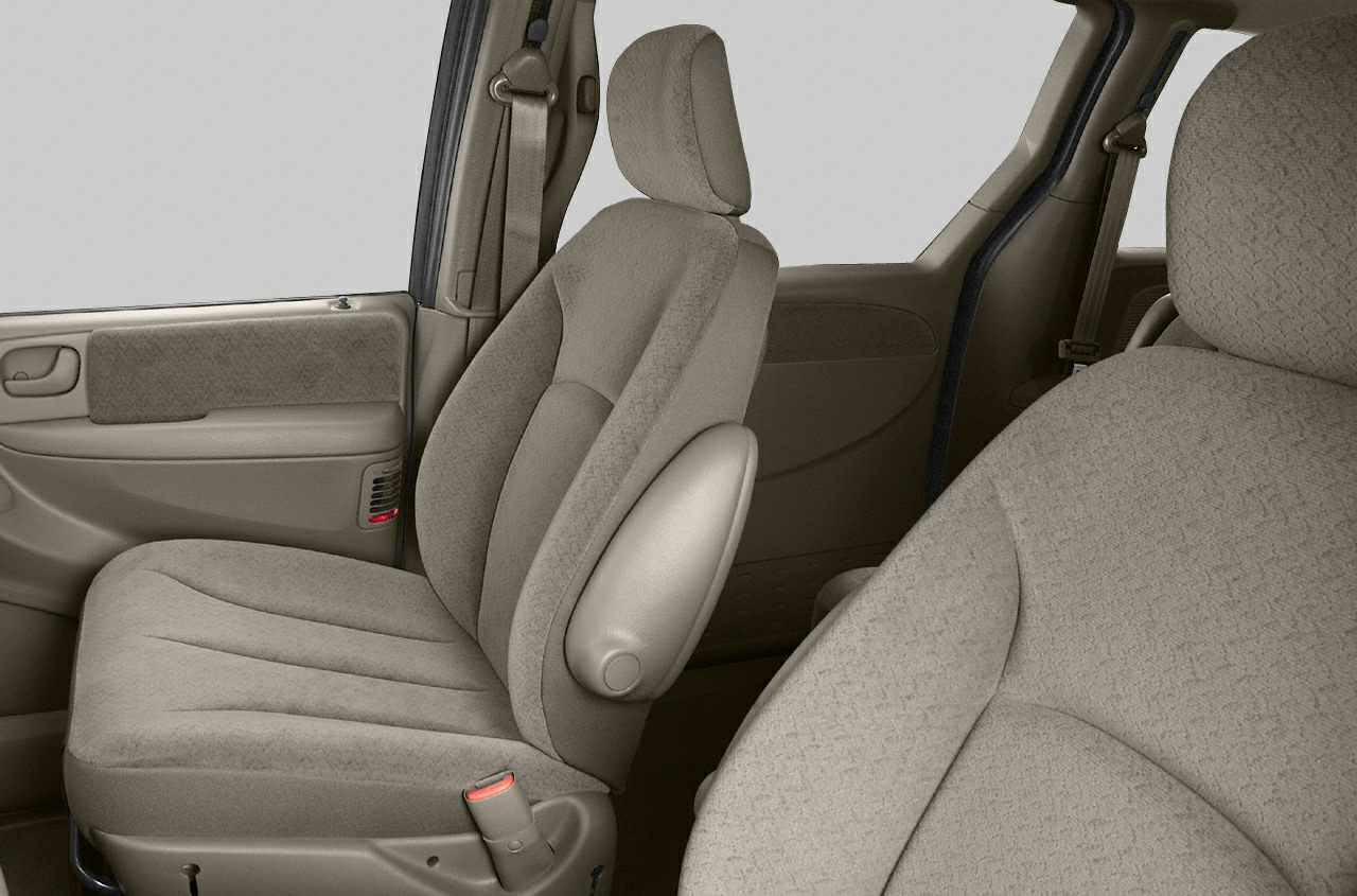 Front seat fabric upholstery and door panel with armrest
