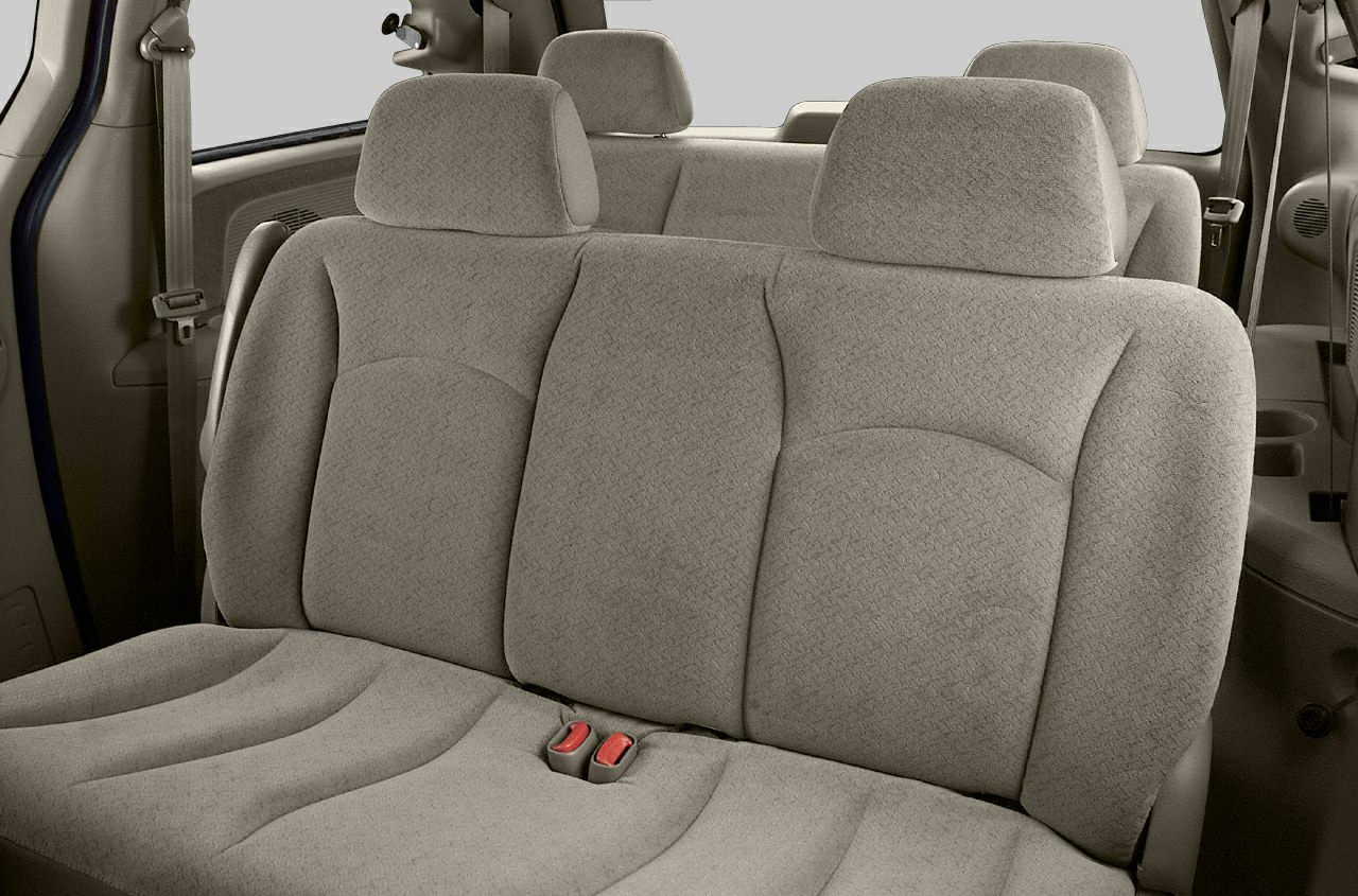 Rear cloth seats with headrests and seatbelt buckles