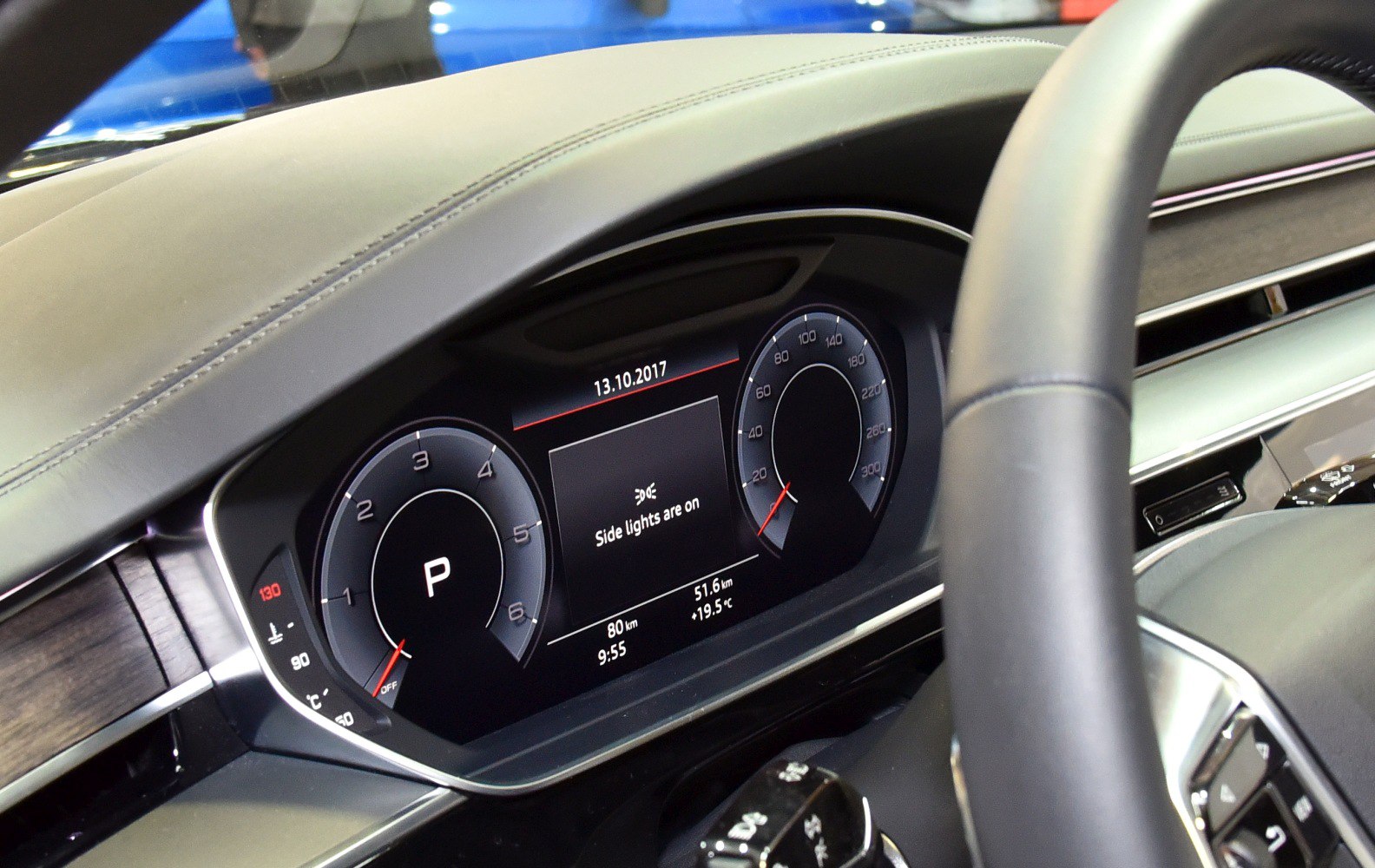 Digital instrument cluster with speedometer, tachometer, temp gauge and central display