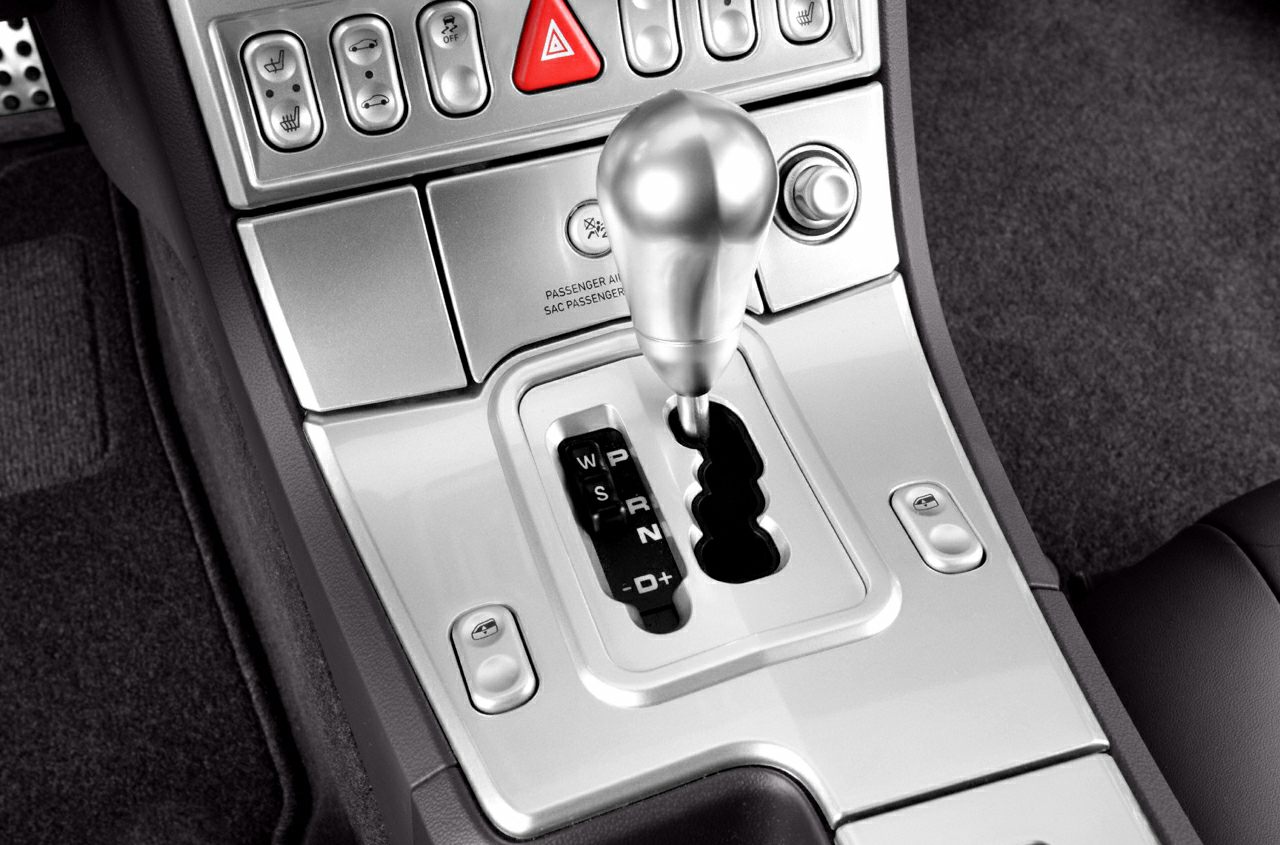 Automatic gear shifter with control buttons in sleek center console