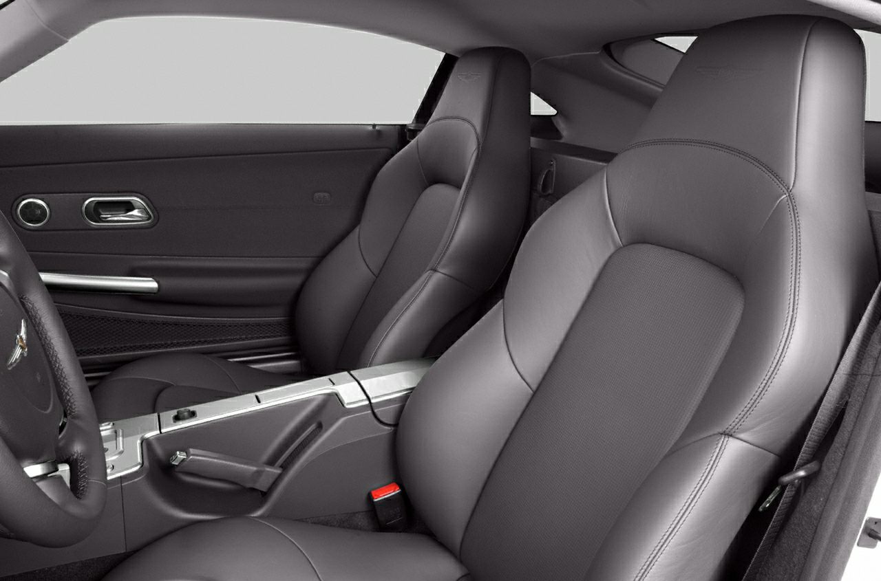 Black leather seats and door panel with silver door handle