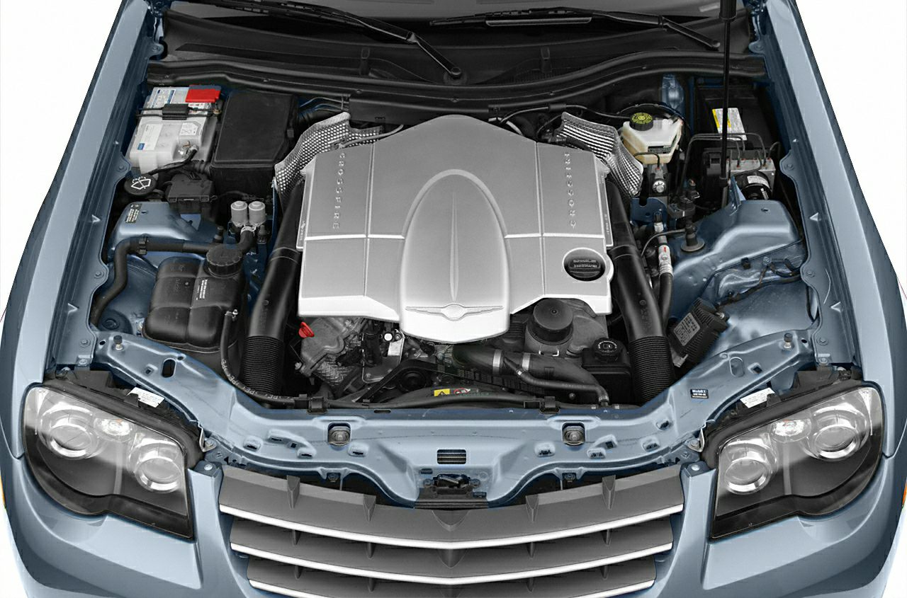 V6 engine in front-mounted compartment with dual headlights
