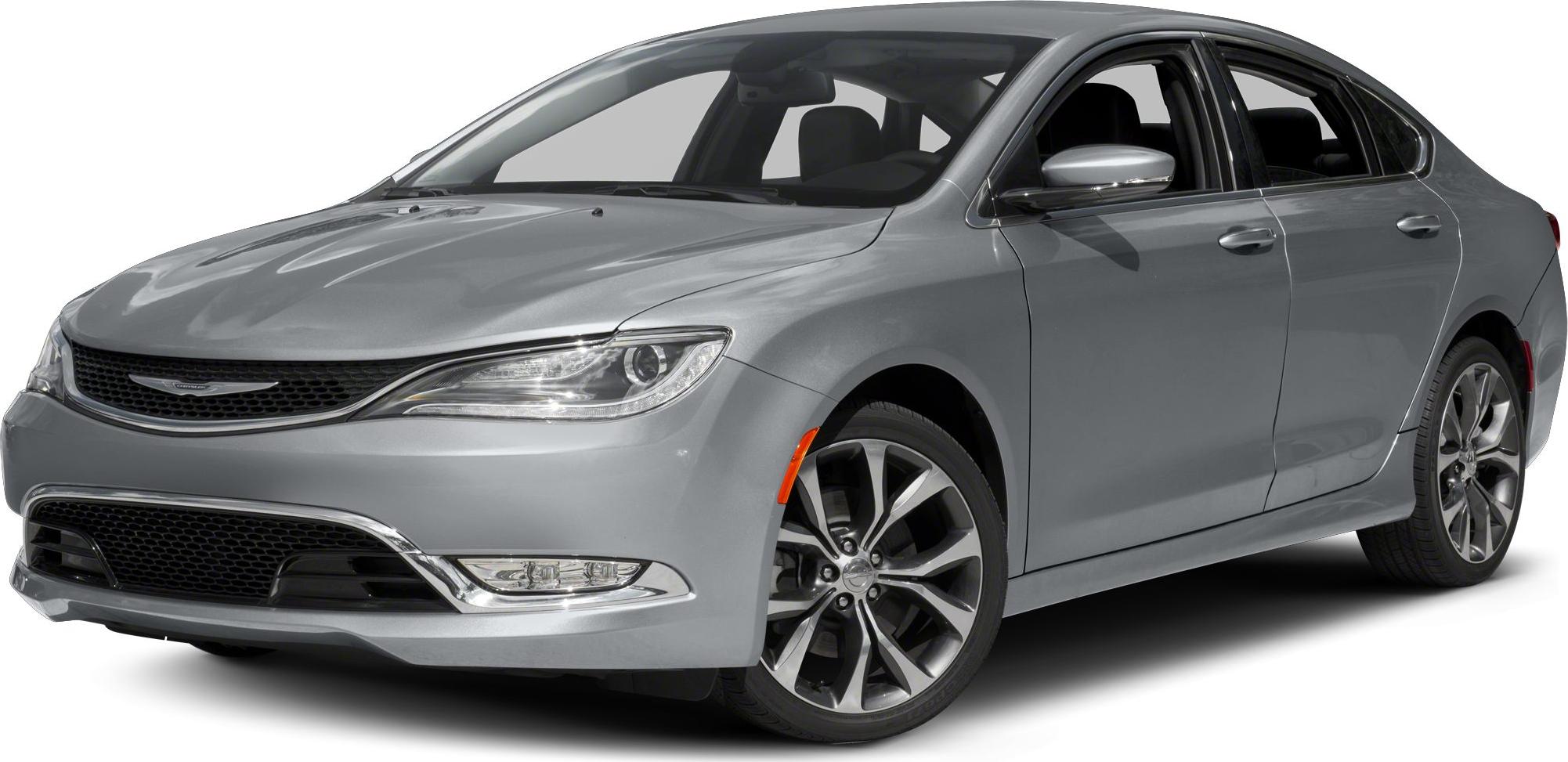 Silver sedan front side with sleek headlights and alloy wheels