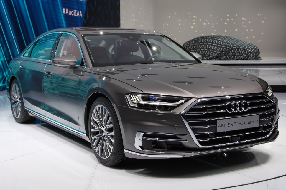 Luxury sedan front end with LED headlights and chrome grille