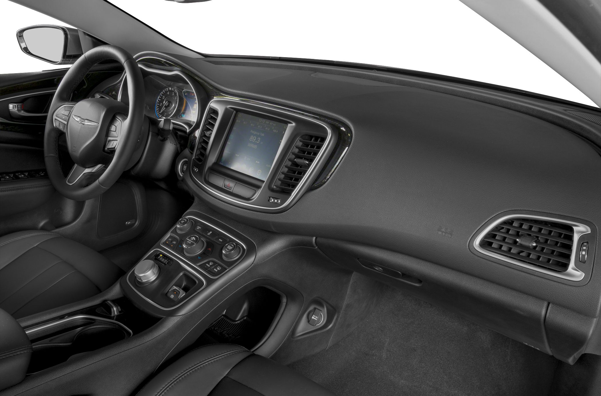 Dashboard, steering wheel, infotainment screen, and climate controls.
