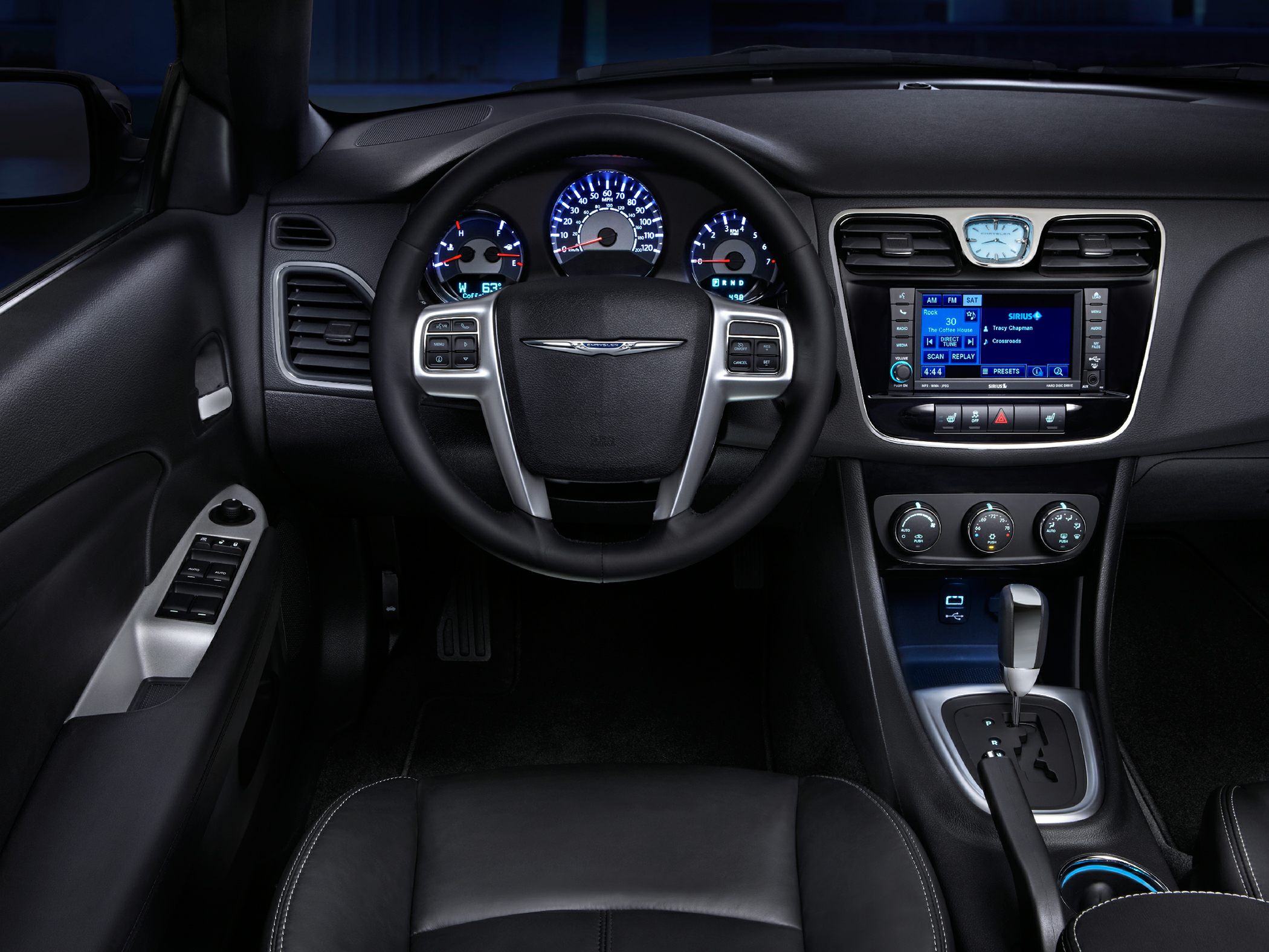Modern car dashboard with illuminated gauges and touchscreen console