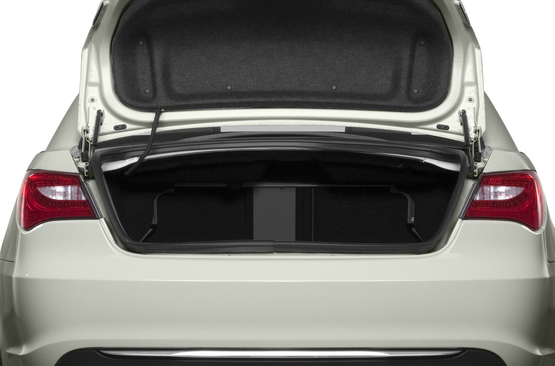 Open trunk of a sedan with visible taillights and trunk interior
