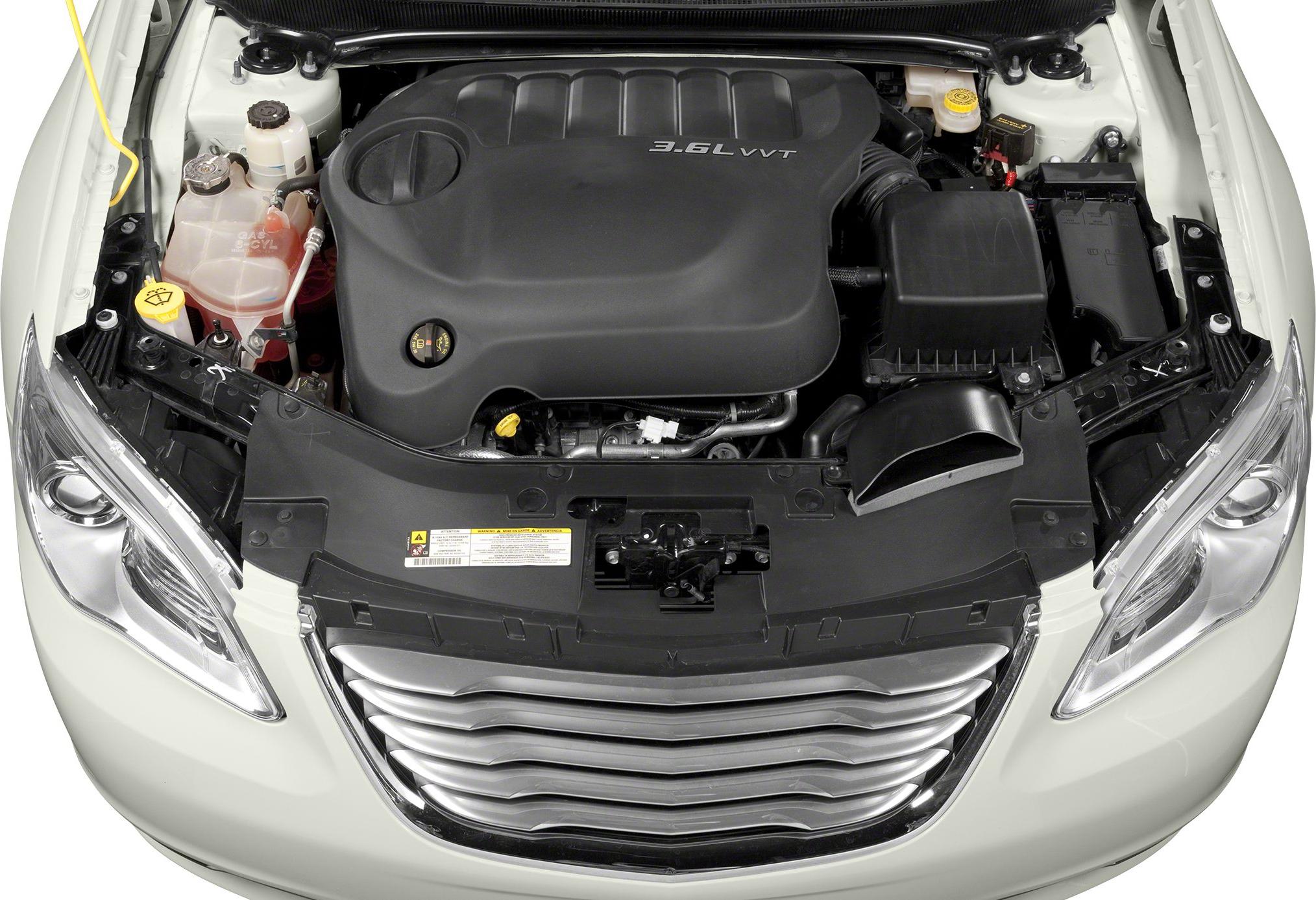 Engine bay with covered 3.6L VVT engine