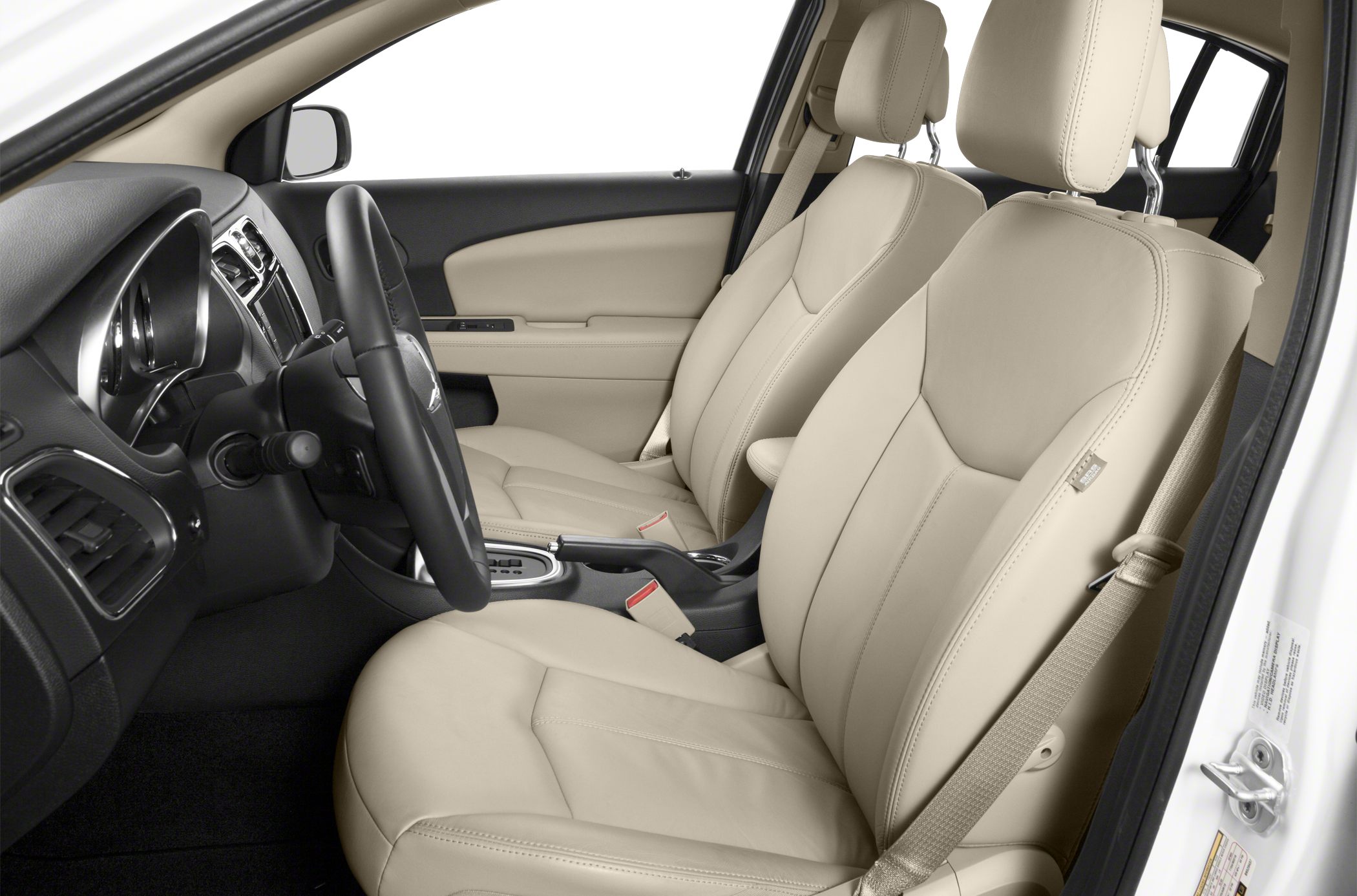 Beige leather front seats and steering wheel with dashboard and door panel.