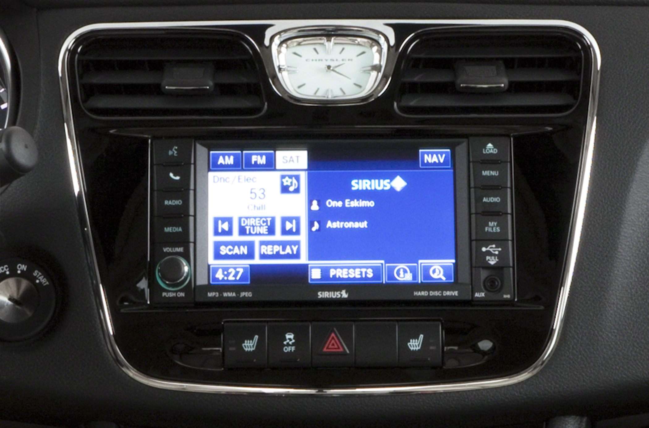 Touchscreen navigation display with analog clock and heated seat controls