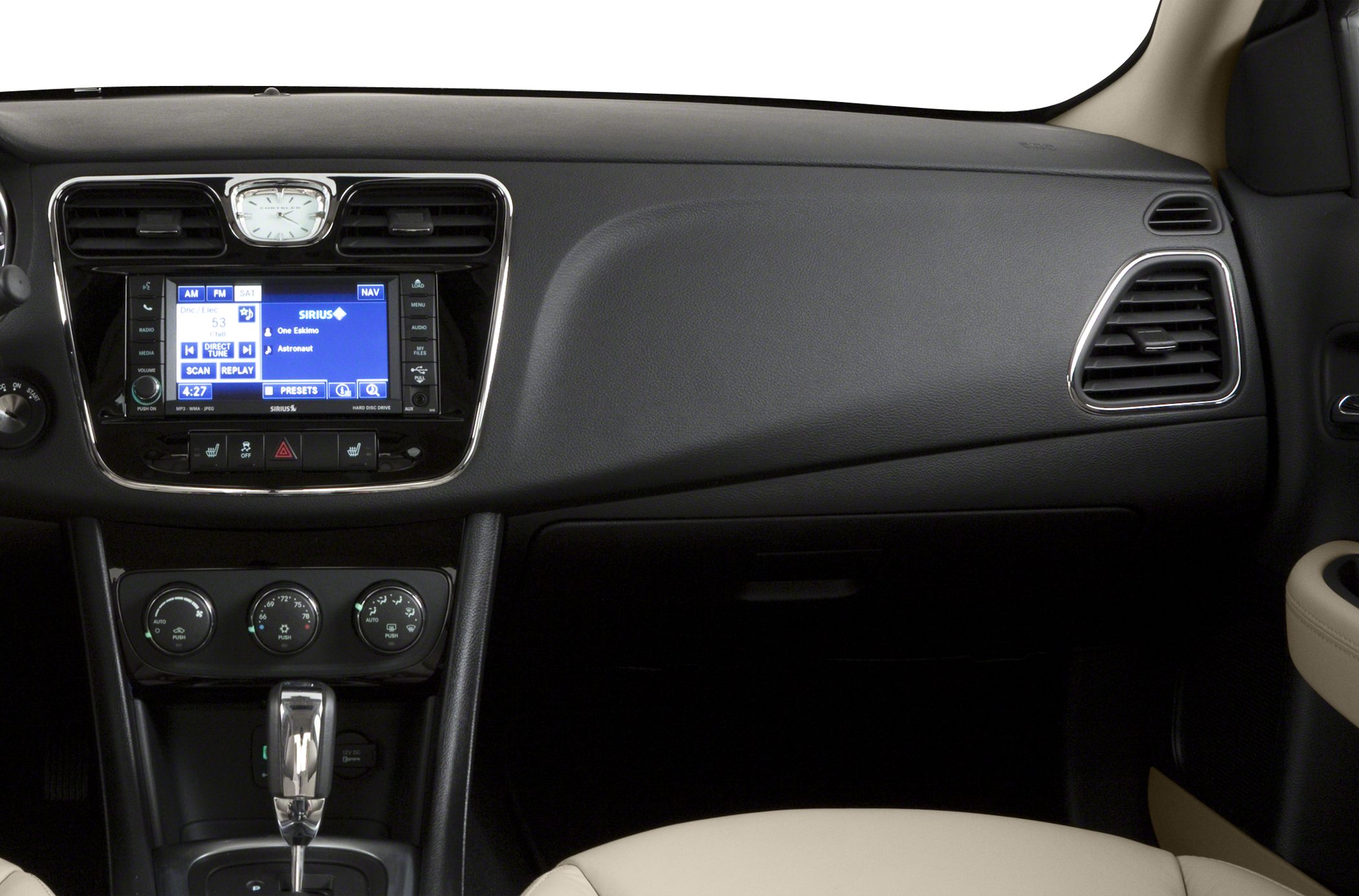Dashboard with infotainment system, climate controls, and gear shifter