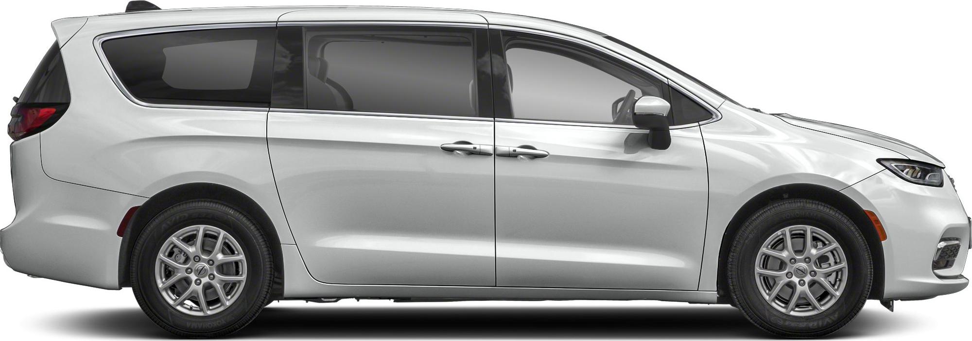 Side profile of minivan with sliding doors and alloy wheels